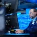 Traders monitor U.S. stock market as AI shares lift major indexes higher. - AP Photo/Seth Wenig