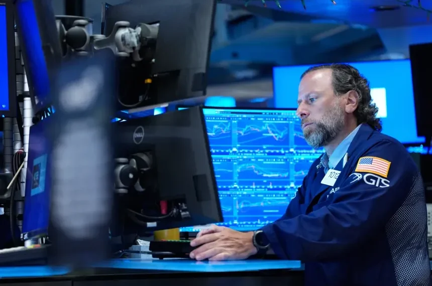 Traders monitor U.S. stock market as AI shares lift major indexes higher. - AP Photo/Seth Wenig