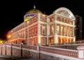Exterior view of the historic Amazon Theatre in Manaus, Amazonas, Brazil, illuminated at night.