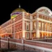 Exterior view of the historic Amazon Theatre in Manaus, Amazonas, Brazil, illuminated at night.