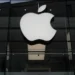 Apple and OpenAI logos representing trade secrets lawsuit over AI hardware - AP Photo/Matthias Schrader, File