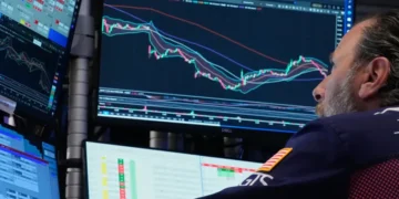 Investors monitor Asian stock markets alongside oil and currency developments. - AP Photo/Richard Drew