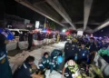 Emergency responders work at the scene of a deadly pub fire in Bangkok. - AP Photo/Sakchai Lalit