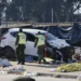 Emergency responders work at the scene after a vehicle crashed into an open-air market in Viña del Mar, Chile. - Sebastian Cisterna/ATON via AP