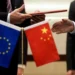 Chinese and European Union officials discuss trade cooperation and economic relations. - AP Photo/Andy Wong, File