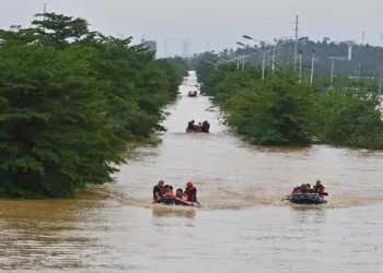Rescue teams evacuate residents from severe flooding in Guangxi, southern China. - Zhou Hua/Xinhua via AP