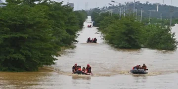 Rescue teams evacuate residents from severe flooding in Guangxi, southern China. - Zhou Hua/Xinhua via AP