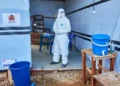 Healthcare workers respond to the Ebola outbreak in eastern Democratic Republic of Congo. - AP Photo/Dirole Lotsima Dieudonne