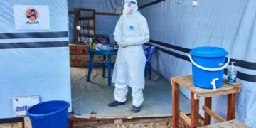 Healthcare workers respond to the Ebola outbreak in eastern Democratic Republic of Congo. - AP Photo/Dirole Lotsima Dieudonne