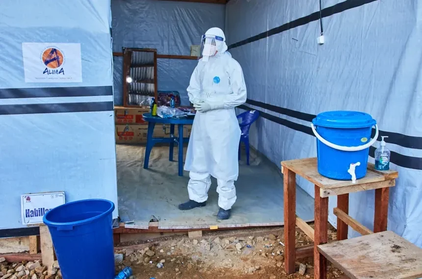 Healthcare workers respond to the Ebola outbreak in eastern Democratic Republic of Congo. - AP Photo/Dirole Lotsima Dieudonne