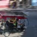 Solar-powered electric tricycles travel through the streets of Havana, Cuba. - AP Photo/Ramon Espinosa