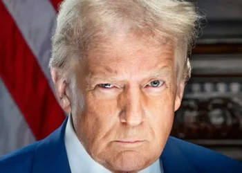 Official portrait of U.S. President Donald Trump photographed in the White House.