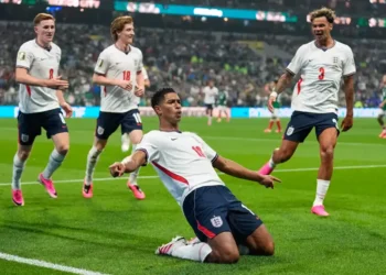 England celebrates after defeating Mexico in the World Cup at Estadio Azteca. - AP Photo/Natacha Pisarenko