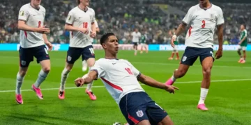 England celebrates after defeating Mexico in the World Cup at Estadio Azteca. - AP Photo/Natacha Pisarenko