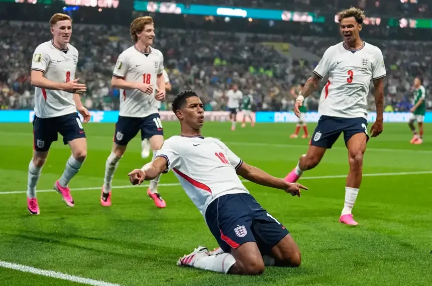 England celebrates after defeating Mexico in the World Cup at Estadio Azteca. - AP Photo/Natacha Pisarenko