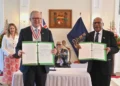 Australian and Fijian leaders sign a defense agreement in Suva. - Mick Tsikas/AAP image via AP1