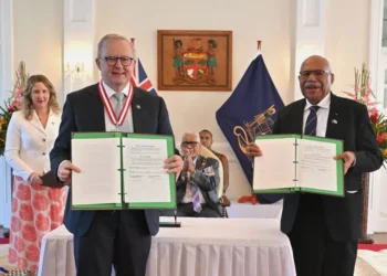 Australian and Fijian leaders sign a defense agreement in Suva. - Mick Tsikas/AAP image via AP1