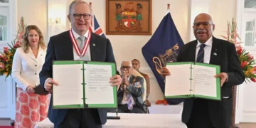 Australian and Fijian leaders sign a defense agreement in Suva. - Mick Tsikas/AAP image via AP1