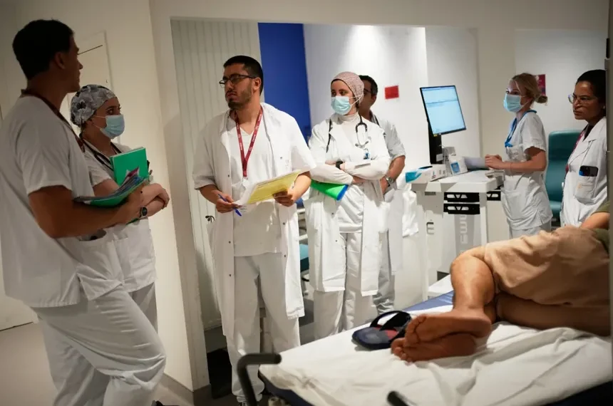 Medical staff prepare hospital cooling measures during Europe's extreme heat wave - AP Photo/Christophe Ena