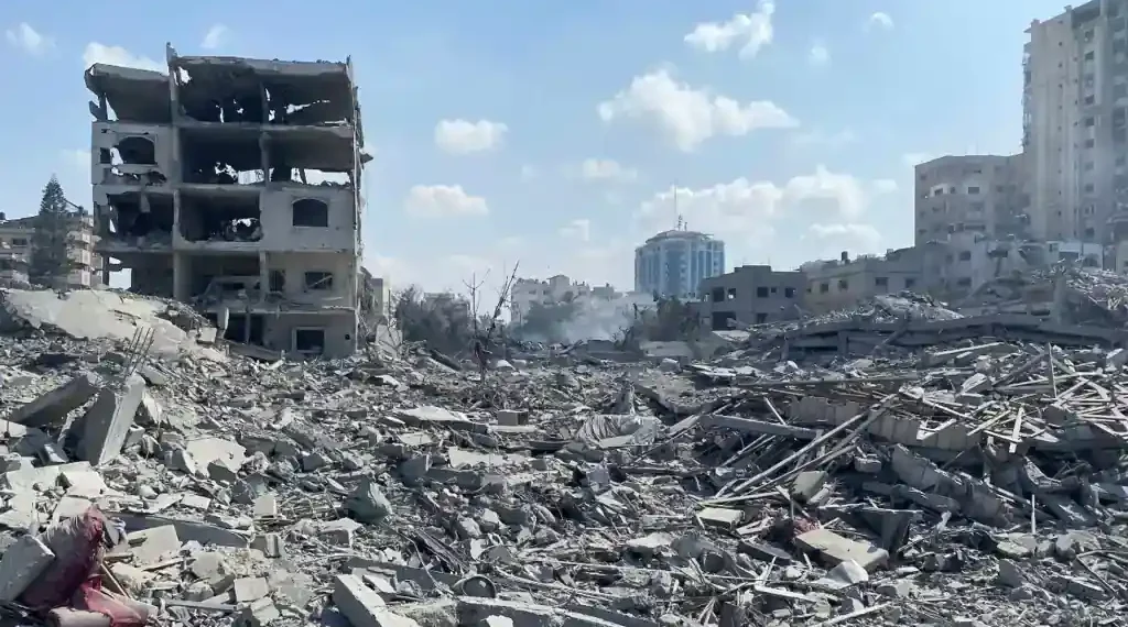 Damaged residential buildings in Gaza City's Rimal neighborhood following an Israeli airstrike during the early days of the Gaza war in October 2023.