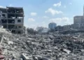 Damaged residential buildings in Gaza City's Rimal neighborhood following an Israeli airstrike during the early days of the Gaza war in October 2023.