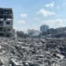Damaged residential buildings in Gaza City's Rimal neighborhood following an Israeli airstrike during the early days of the Gaza war in October 2023.