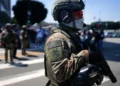 ICE officers during immigration enforcement amid debate over body camera deployment - AP Photo/Eric Thayer, File