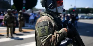 ICE officers during immigration enforcement amid debate over body camera deployment - AP Photo/Eric Thayer, File