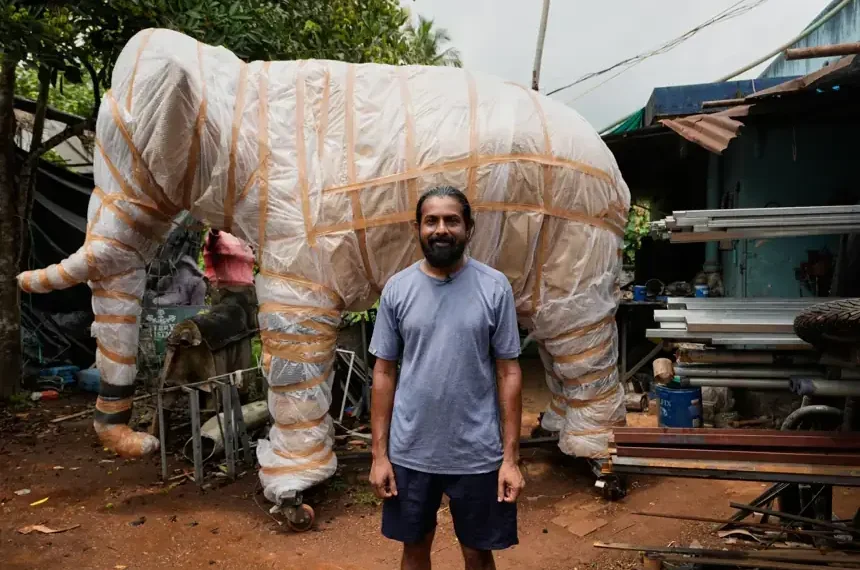 Robotic elephant displayed at a Hindu temple in Kerala, India. - AP Photo/Aijaz Rahi