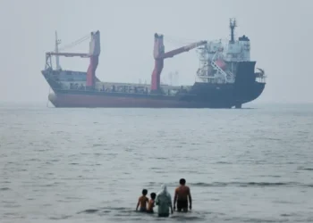 Commercial oil tankers transit the Strait of Hormuz amid rising regional tensions. - Amirhosein Khorgooi/SNA via AP