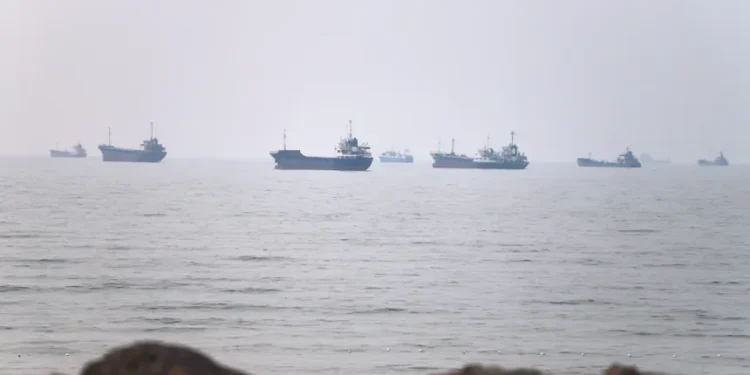 Commercial ships transit the Strait of Hormuz amid renewed US-Iran diplomatic tensions. - Amirhosein Khorgooi/ISNA via AP