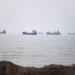 Commercial ships transit the Strait of Hormuz amid renewed US-Iran diplomatic tensions. - Amirhosein Khorgooi/ISNA via AP