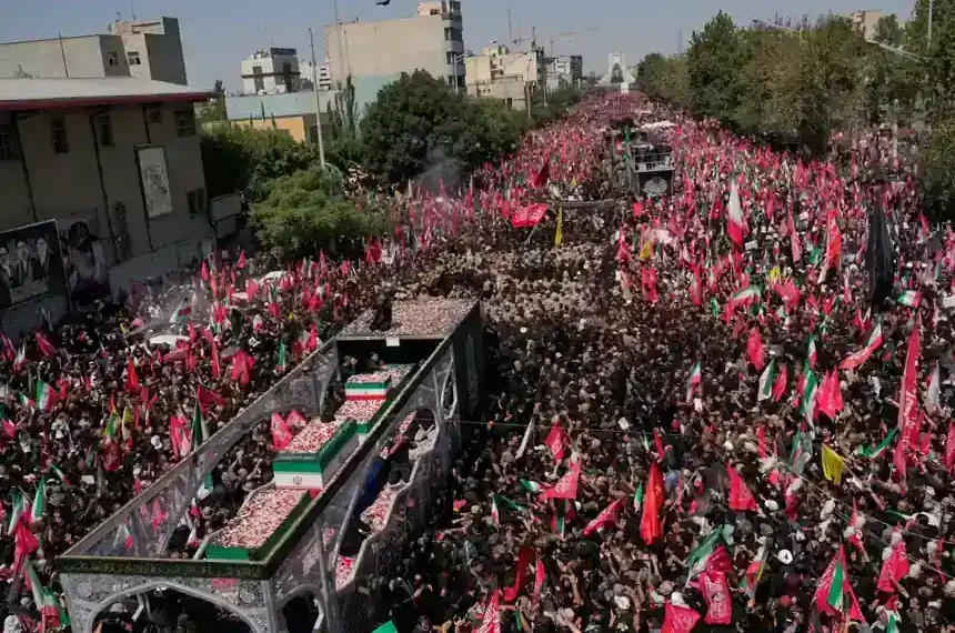 Mourners gather during Ayatollah Ali Khamenei's funeral procession in Tehran. - AP Photo/Vahid Salemi