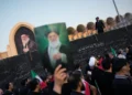 Mourners attend Ayatollah Ali Khamenei's funeral procession in Tehran, Iran. - AP Photo/Altaf Qadri