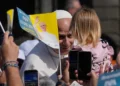 Pope Leo XIV greets residents from Castel Gandolfo during summer retreat - AP Photo/Alessandra Tarantino