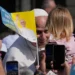 Pope Leo XIV greets residents from Castel Gandolfo during summer retreat - AP Photo/Alessandra Tarantino