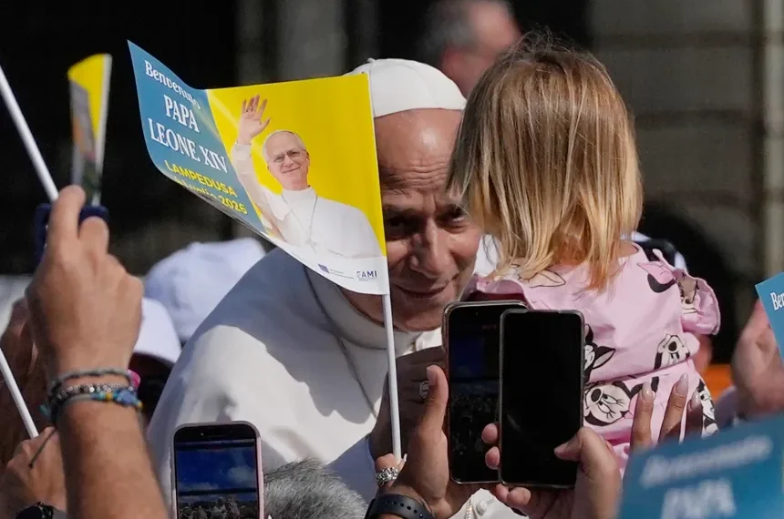 Pope Leo XIV greets residents from Castel Gandolfo during summer retreat - AP Photo/Alessandra Tarantino
