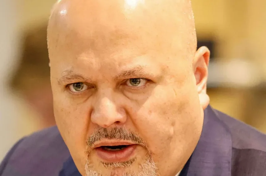 Portrait of International Criminal Court Prosecutor Karim Khan during a meeting in Brussels in 2022.