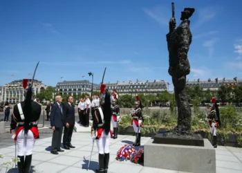 French President Emmanuel Macron attends the unveiling of the Alfred Dreyfus statue in Paris. - Thomas Samson/Pool Photo via AP