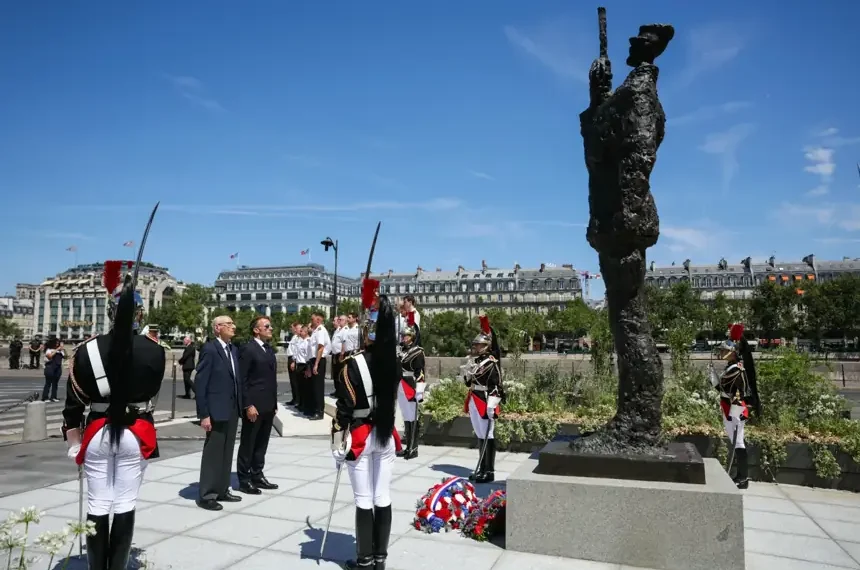 French President Emmanuel Macron attends the unveiling of the Alfred Dreyfus statue in Paris. - Thomas Samson/Pool Photo via AP