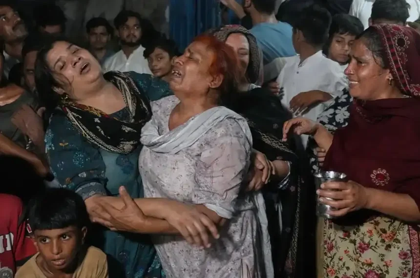 Rescue workers search collapsed tutoring center after deadly roof failure in Lahore - AP Photo/K.M Chaudary
