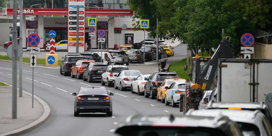 Vehicles wait in long queues outside Russian fuel stations amid shortages - AP Photo/Pavel Bednyakov