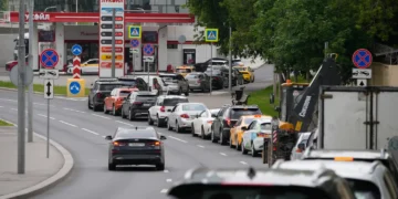 Vehicles wait in long queues outside Russian fuel stations amid shortages - AP Photo/Pavel Bednyakov