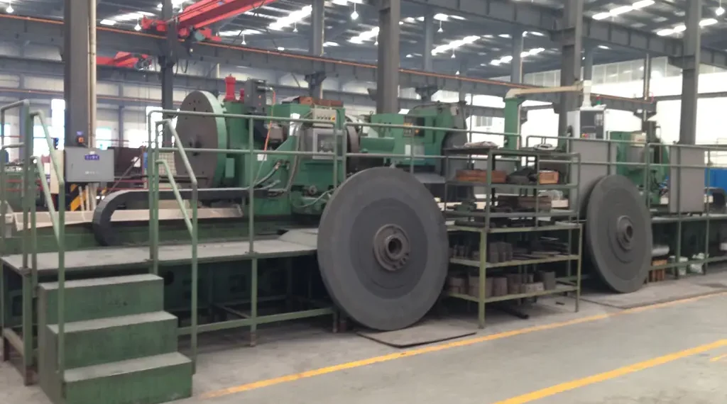 Exterior view of the Sichuan Jinxing Compressor Manufacturing Co., Ltd. factory in Chengdu, China, showing industrial buildings and manufacturing facilities.