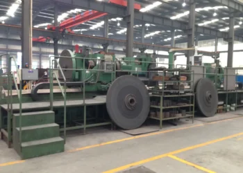 Exterior view of the Sichuan Jinxing Compressor Manufacturing Co., Ltd. factory in Chengdu, China, showing industrial buildings and manufacturing facilities.