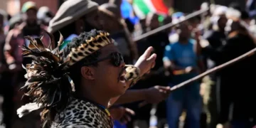 Demonstrators march during anti-immigration protests in Johannesburg - AP Photos/Themba Hadebe