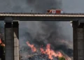 Firefighters battle a deadly wildfire in Spain's Almeria province. - AP Photo/Gregorio Marrero