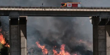 Firefighters battle a deadly wildfire in Spain's Almeria province. - AP Photo/Gregorio Marrero