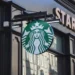 Exterior of a Starbucks coffee shop on the Royal Mile in Edinburgh, Scotland, displaying the company's storefront and signage.