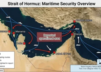 Editorial map of the Strait of Hormuz showing major shipping routes, regional ports, and the reported operational area between Iran, Oman, and the United Arab Emirates.